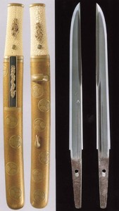 Two exquisitely mounted identical Tanto: cut-away at right to show the blade and tang